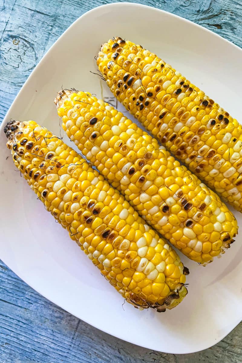 3 ears of grilled corn on the cob for making a blueberry corn salad