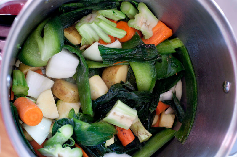 This homemade vegetable stock recipe can save you so much money by using veggie scraps stored in the freezer. From EatingRichly.com