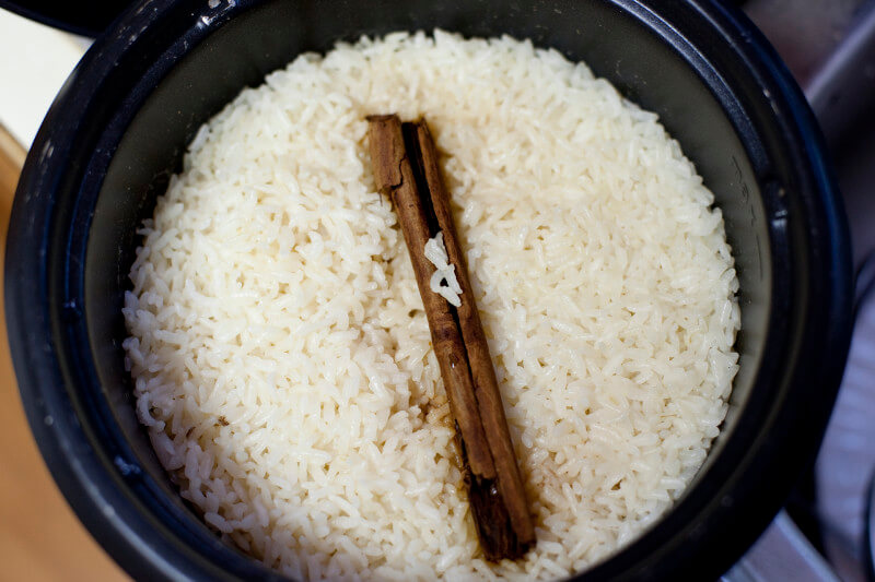 Rice is cooked with a cinnamon stick, then tossed with saffron, pomegrante seeds, and fresh mint for this aromatic pomegranate saffron rice recipe. From EatingRichly.com