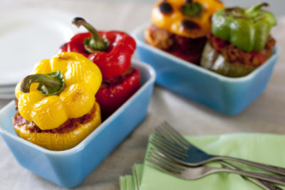 red meat stuffed yellow red and green peppers in blue baking dishes  Floor Crimson meat Dinner in a Pumpkin 041112stuffed bell pepper recipe 400x267