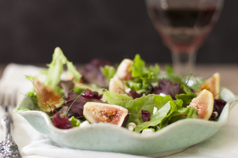 Summer Fig Salad on a mint green scalloped plate