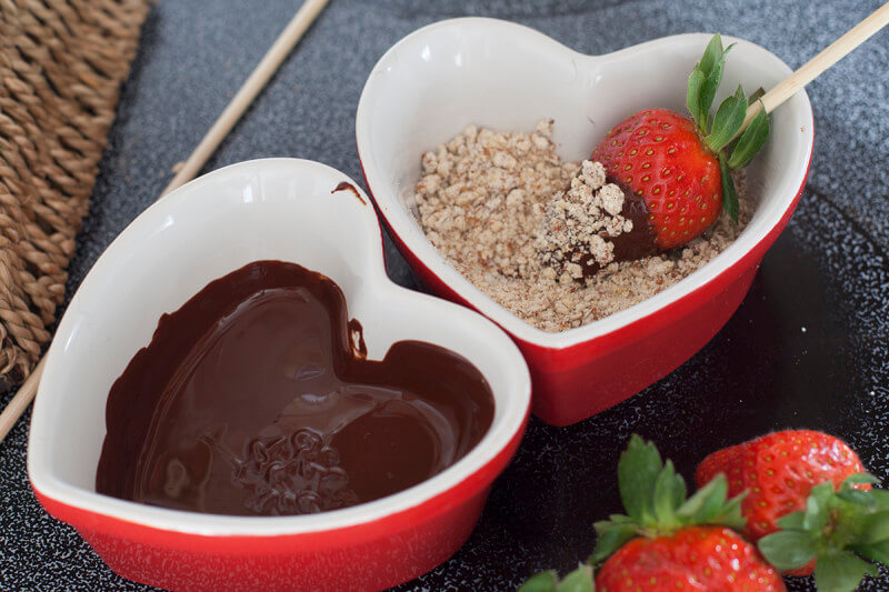 These dark chocolate almond covered strawberries are the perfect Valentine dessert for guys to surprise their wife or girlfriend with. They're swoon worthy!