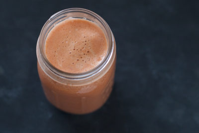 Delicious juice recipe of sweet potato, strawberries, and green apple. EatingRichly.com