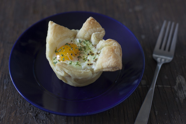 Puff pastry egg in a basket for Mother's Day lunch at EatingRichly.com