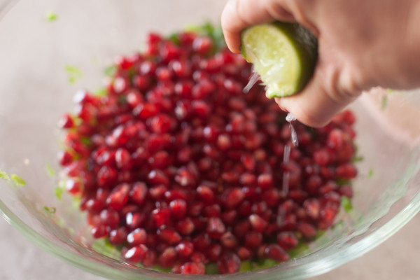 This fresh pomegranate salsa is festive and fun in red and green Christmas colors. | EatingRichly.com