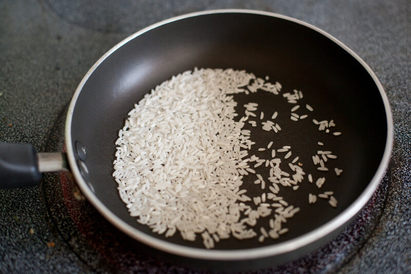 dry rice in a skillet