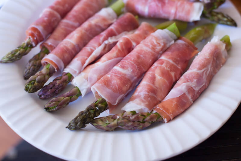 This goat cheese stuffed prosciutto wrapped asparagus recipe is so easy, a toddler can make it!