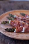 This goat cheese stuffed prosciutto wrapped asparagus recipe is so easy, a toddler can make it!