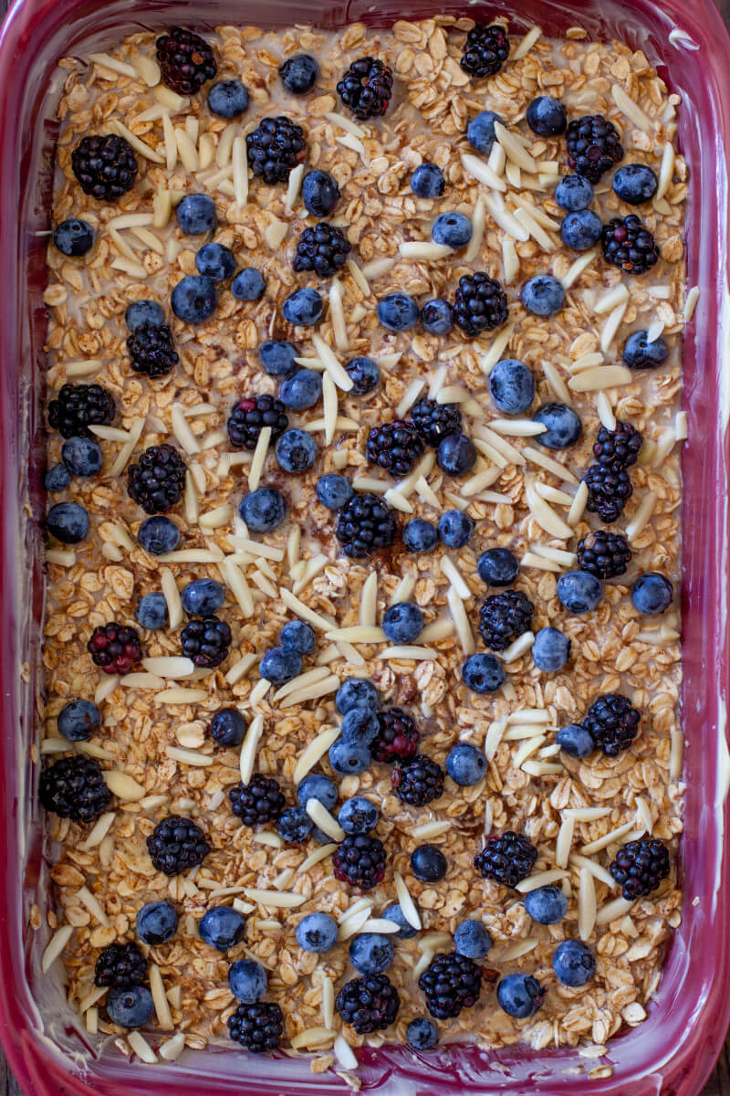 This easy black and blueberry baked oatmeal recipe is a healthy breakfast to make ahead & enjoy throughout the week, or perfect to feed a crowd at brunch. From EatingRichly.com