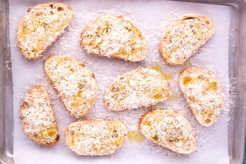 This 10 minute Parmesan cheese bread makes a crunchy savory toast that's the perfect easy side for soup or salad. Bet you can't eat just one piece! From EatingRichly.com