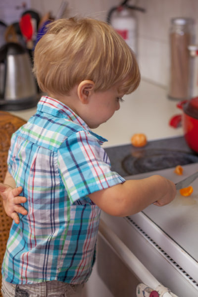 Teach your toddlers knife skills by having them use a table knife on soft foods. Have them keep one hand behind their back to prep them for when they get to try a sharp knife at age 4 or 5. Get more tips and the best kids kitchen knife at EatingRichly.com