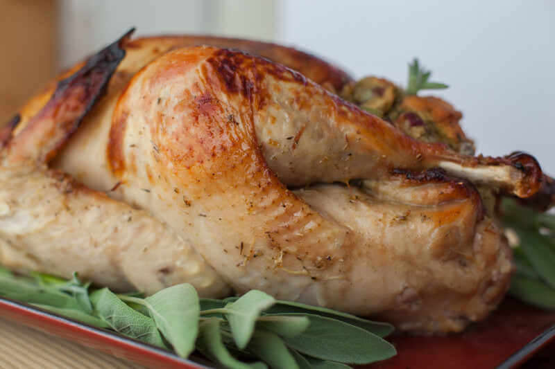 Learn how to cook a turkey in flavorful maple butter packed with fresh herbs and lemon zest. It's so good, you'll want to spread this butter on everything!