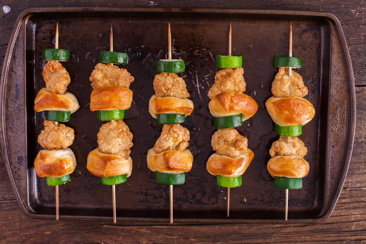 These zucchini, biscuit, and chicken nugget kabobs are a kid friendly meal that your little ones will love to help make. Part of #MiniChefMondays on EatingRichly.com