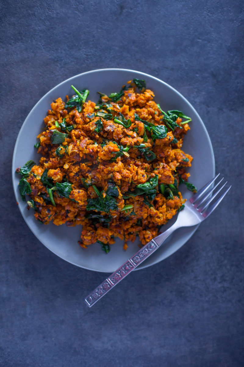 This colorful paleo sweet potato hash recipe has just four ingredients, and packs a nutritional punch that makes it a fantastic side dish for breakfast, lunch, or dinner. Great paleo and vegan St. Patrick's Day recipe! From EatingRichly.com