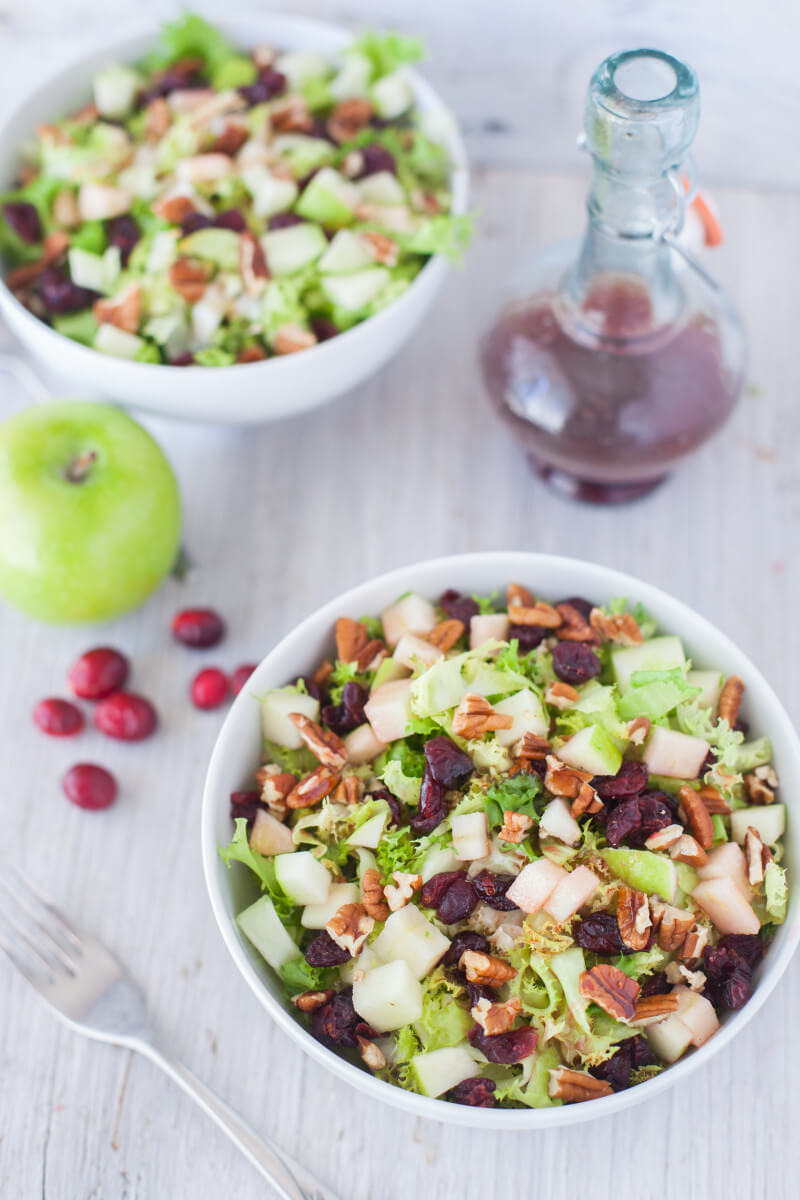 This fast and easy apple cranberry salad recipe makes two filling meals, or four side salads. Plus we walk you through everything you need to know about endive, frisée, escarole, and other chicory vegetables. From EatingRichly.com