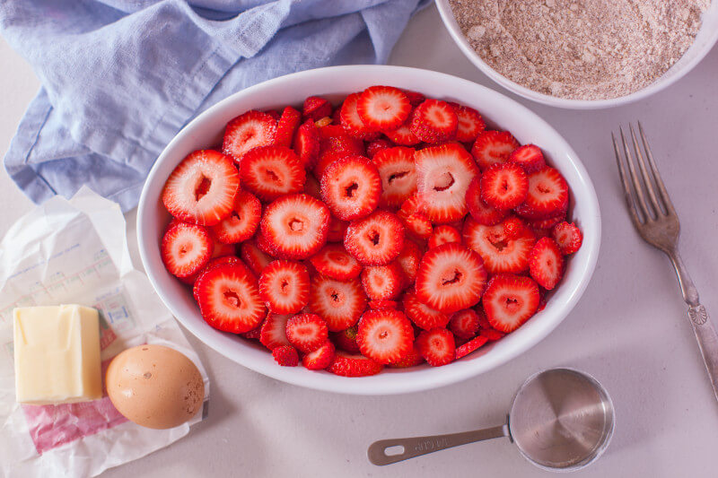 This healthy, easy strawberry cobbler recipe is made with whole foods and perfect for getting your kids in the kitchen. From EatingRichly.com