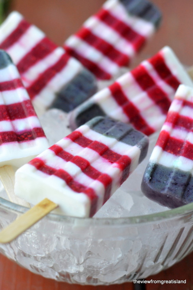 Red, white and blueberry popsicles. Get more recipes for healthy 4th of July desserts at EatingRichly.com.
