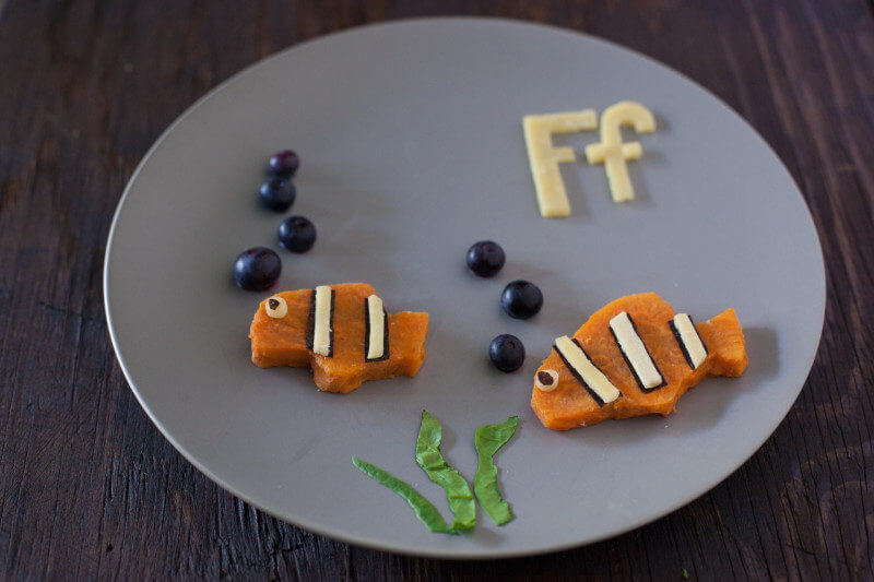 Sweet potato fish are part of our Alphabet Kid Snack series of healthy toddler snacks that make learning fun. Your child will love this cute kid snack! From EatingRichly.com
