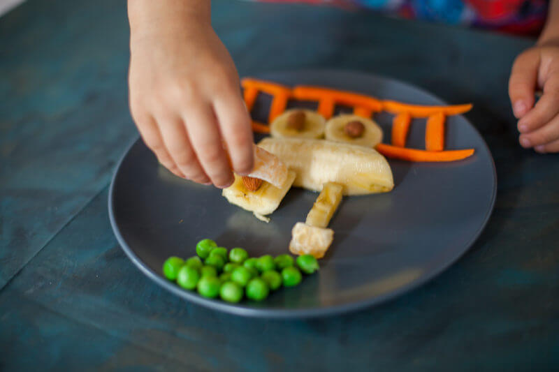 This fruit & veggie train snack is fast and easy to make, & a great way to get produce into any kid who loves trains. You've got to see the reaction video on EatingRichly.com!