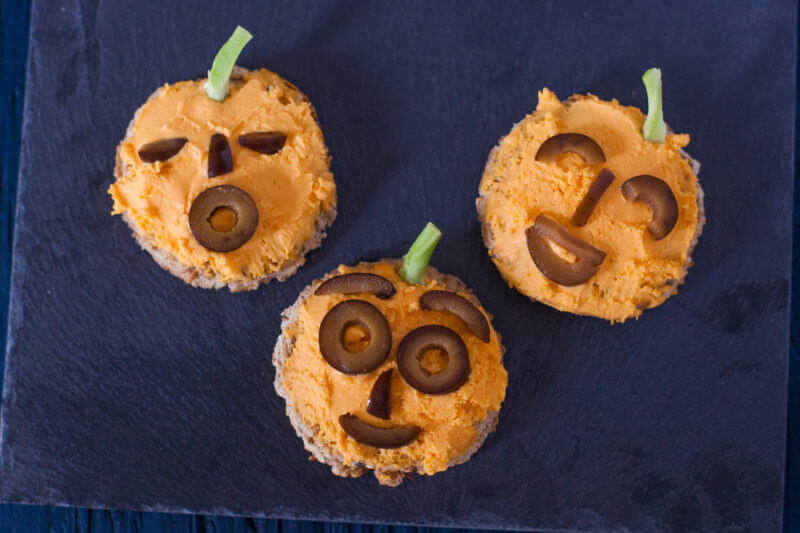 These jack o'lantern toasts make an easy Halloween breakfast for kids, and double as a fun edible craft! From EatingRichly.com
