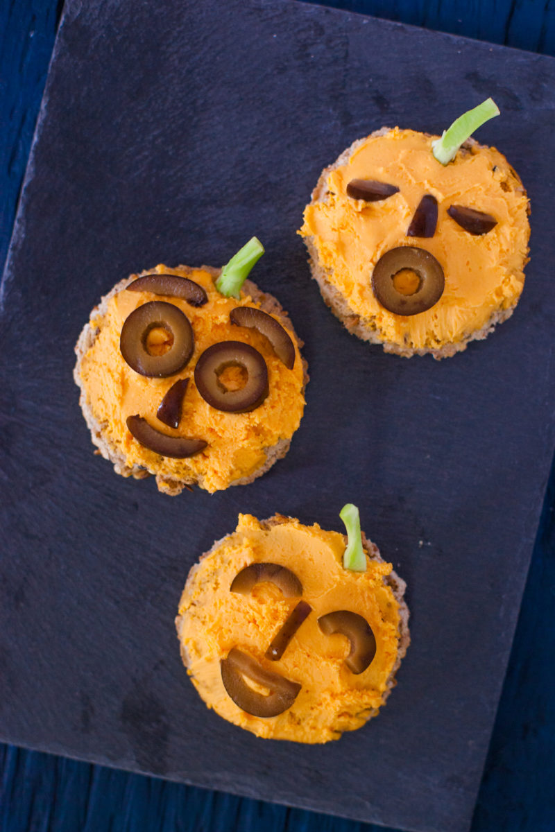 Holiday edible art projects for kids: jack o'lantern toasts from EatingRichly.com