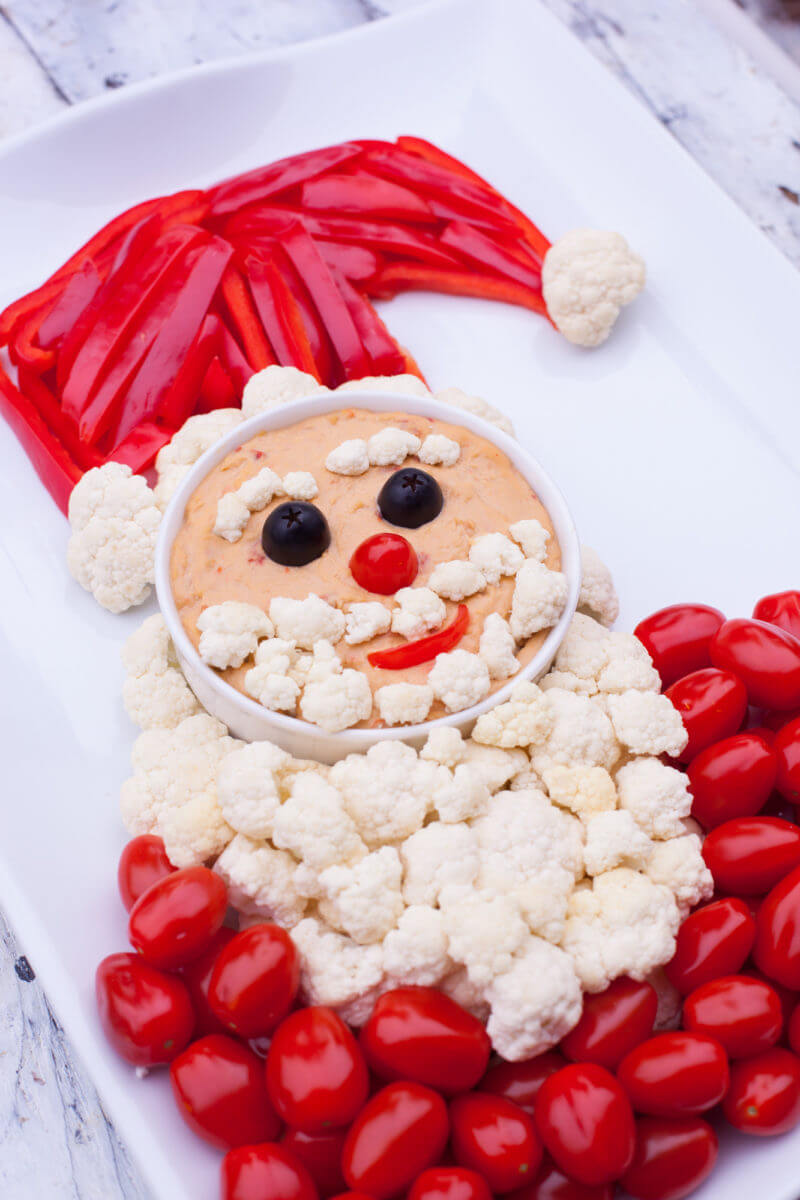 This cute Santa veggie tray is a magical way to bring some healthy options to your Christmas table. From EatingRichly.com