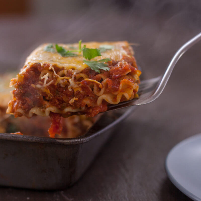This Easy Taco Lasagna recipe comes together quickly and blends two favorite flavors for an out-of-this-world dish. From eatingrichly.com