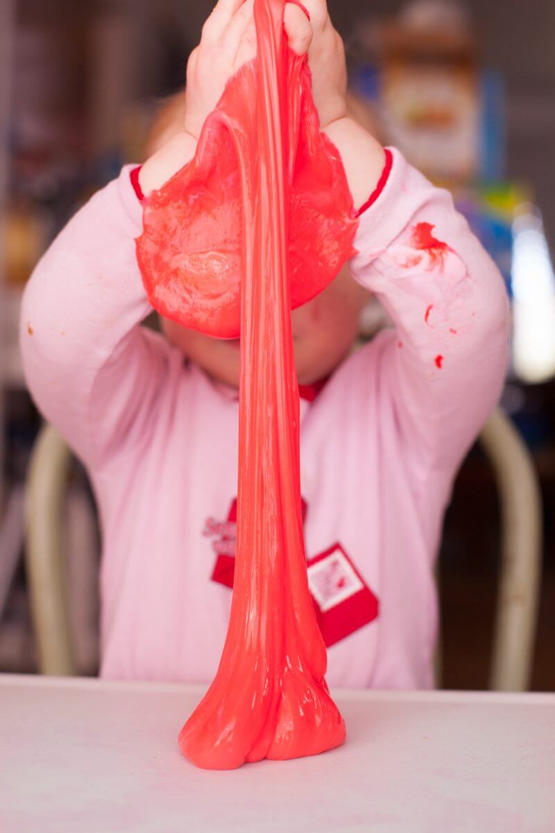This quick and easy borax slime recipe makes a Valentine's Day activity that provides hours of entertainment. From EatingRichly.com