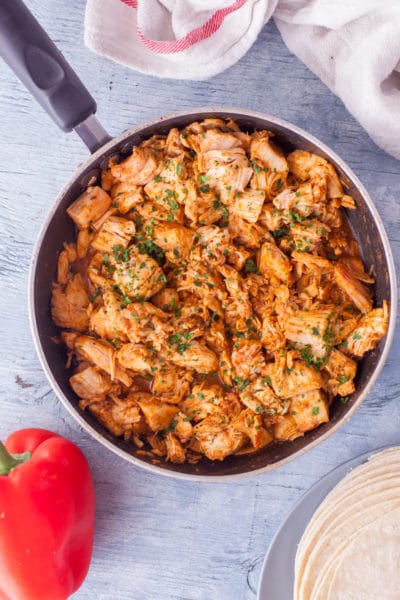 Skillet of chopped chicken cooked in a homemade fajita sauce