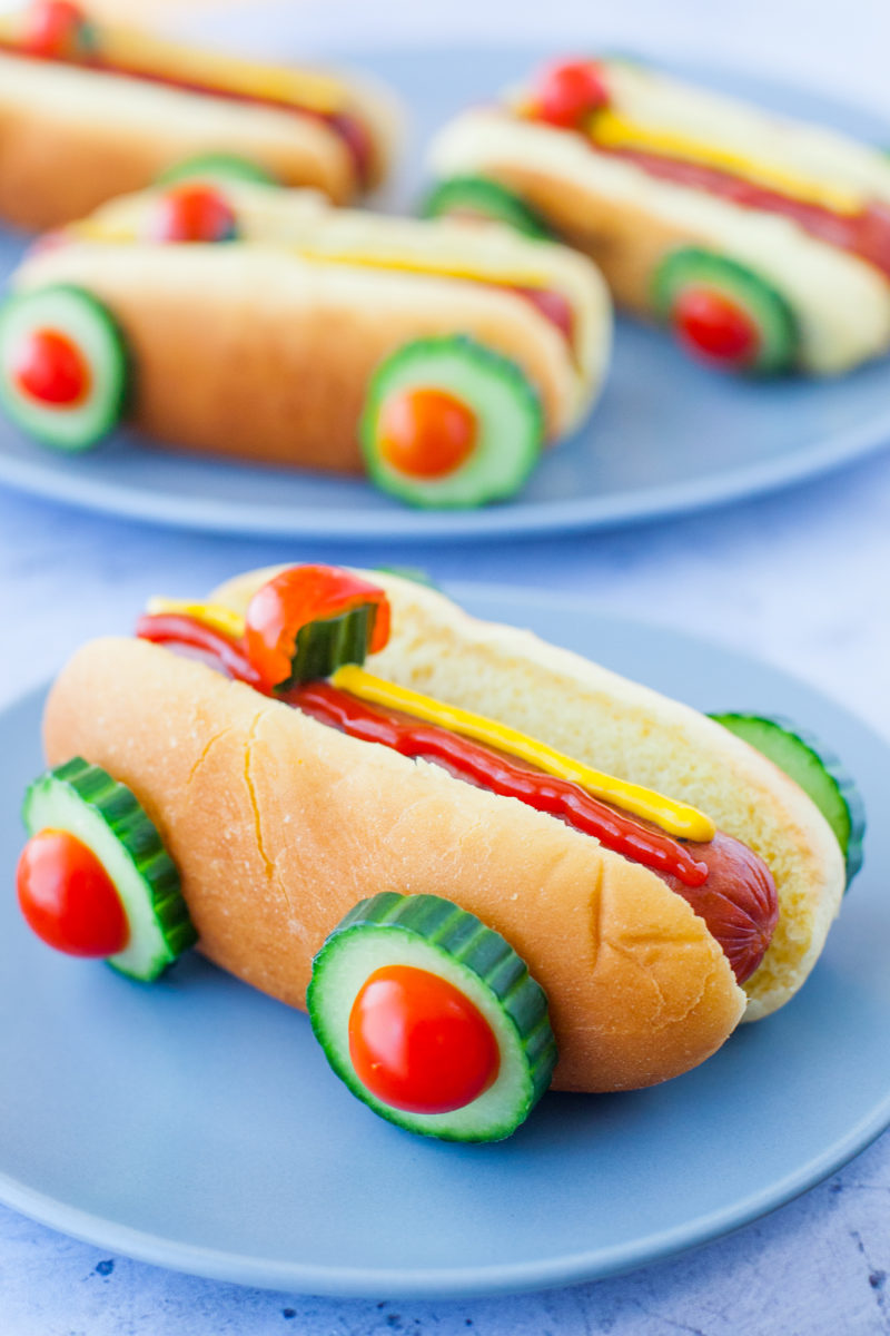These race car hot dogs are SO cute and super easy to make. Perfect for a Cars party, a cute kid's lunch, or a backyard family barbecue. From EatingRichly.com