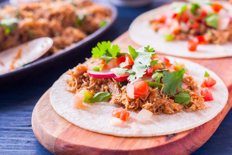 It's so easy to make healthy carnitas that are full of flavor, and using an Instant Pot helps you get your whole meal on the table in 60 minutes! From EatingRichly.com