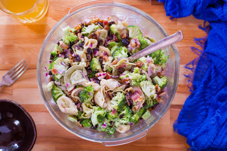 This creamy broccoli tortellini salad is perfect for potlucks and parties, but also makes a complete meal for family dinner! From EatingRichly.com