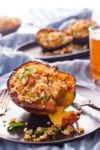 Quinoa stuffed squash with almonds and apricots makes a stunning side, or an easy vegan main dish, that even kids will love. From EatingRichly.com