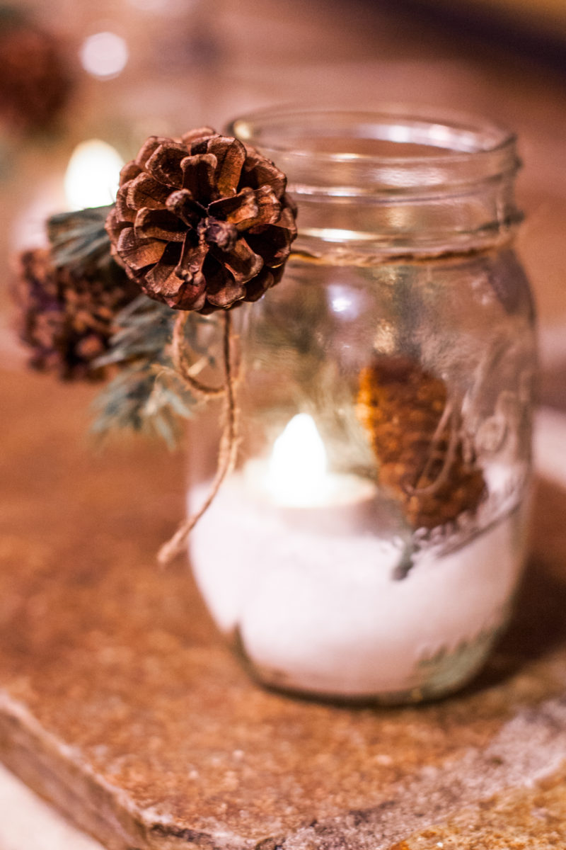 You'll be amazed at how easy it is to make your own beautiful mason jar luminaries Christmas centerpiece. You don't even have to be crafty! From EatingRichly.com