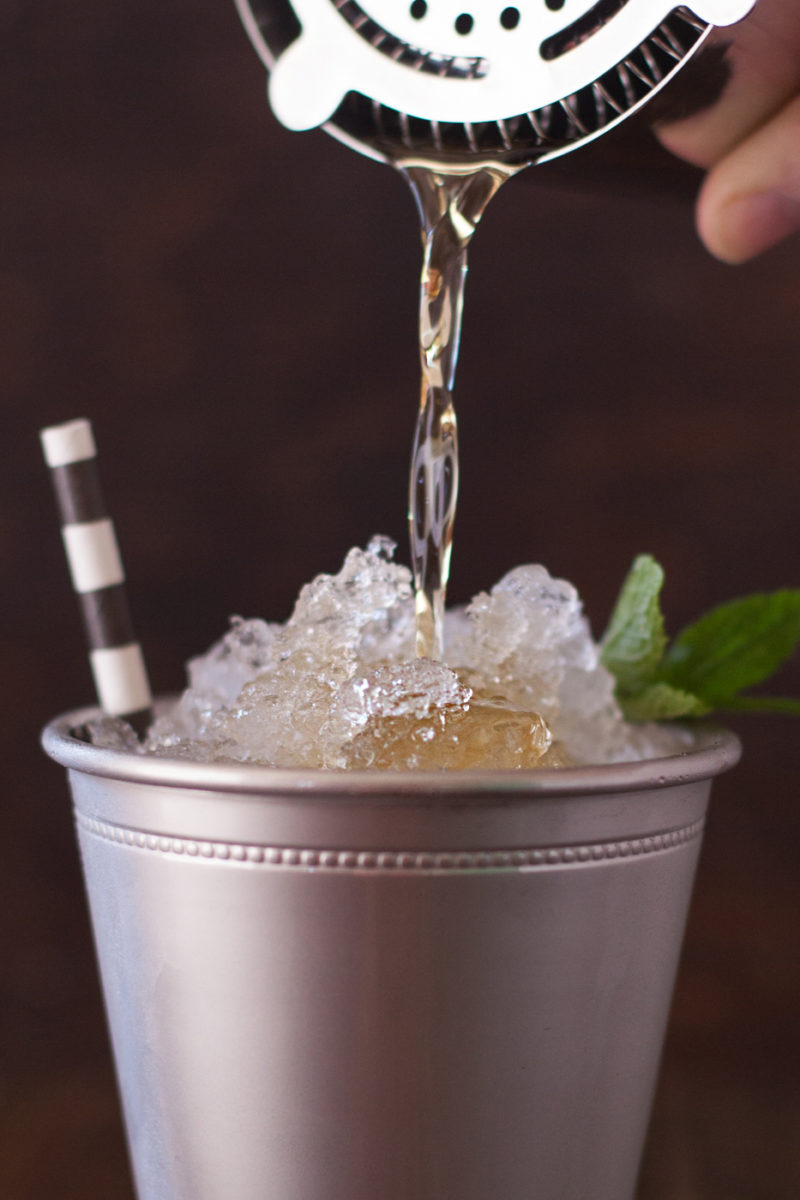 Mint Julep Being Poured Over Ice