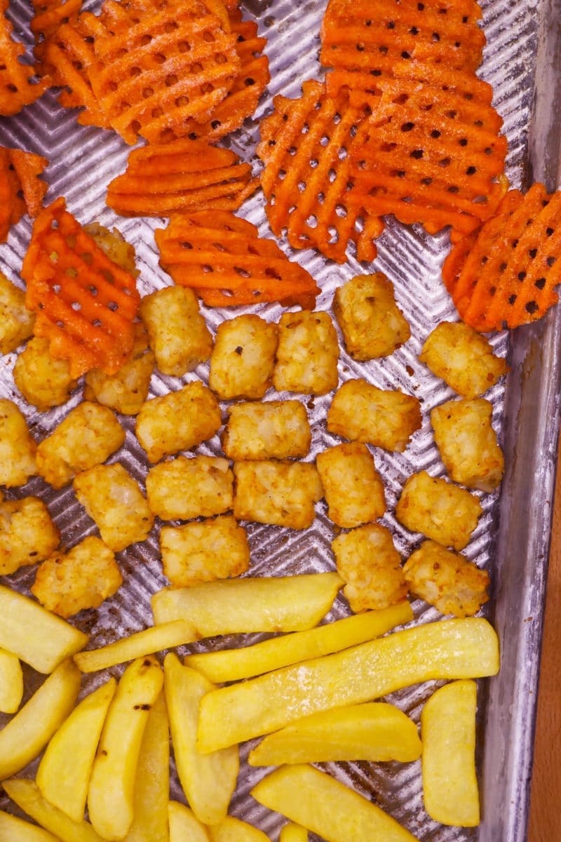 Fries on a baking sheet for a french fry board