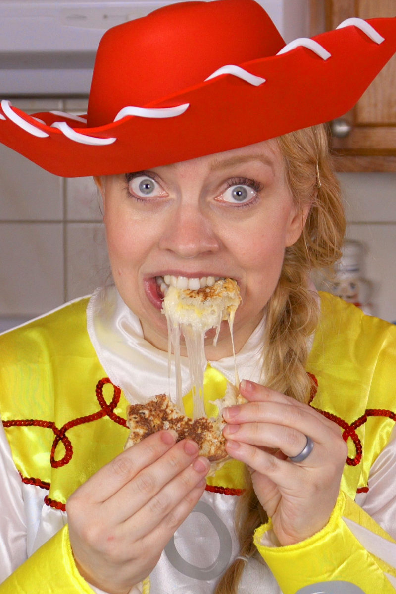 Eating Grilled Sandwich with a Cheese Pull in Jessie Toy Story Costume