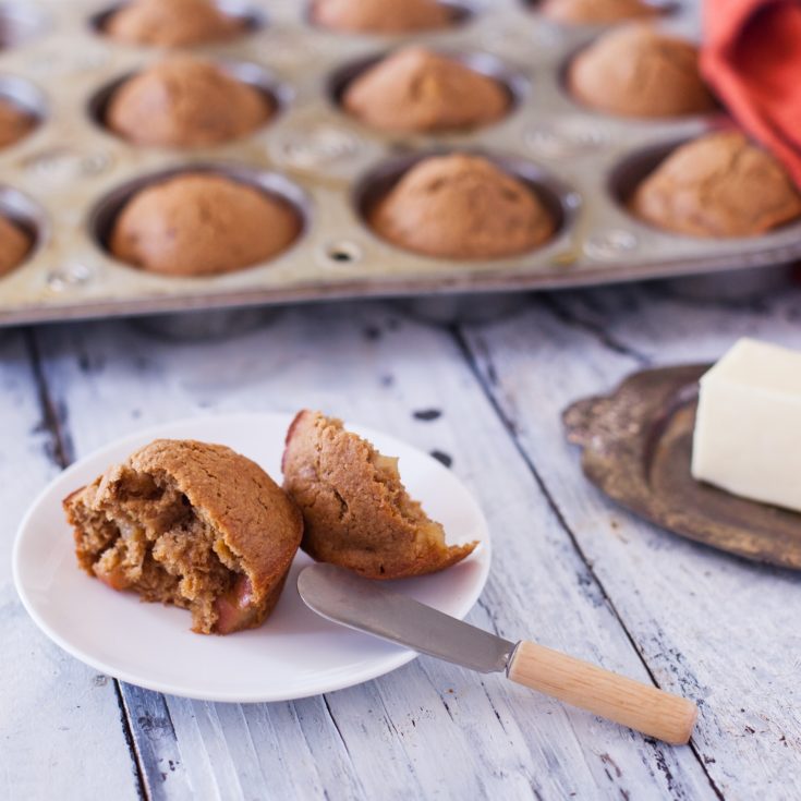 Healthy Apple Muffins in a tin and on a plate