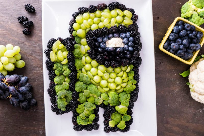 Among Us birthday party food of Green crewmate made from fruits and vegetables edible craft